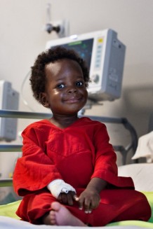 Children's Surgical Hospital, sub-intensive unit. Wasswa Jayson Lubega, M, 2 years old, underwent surgery for burn injuries. He burned himself with the hot soup while mom was cooking. Entebbe, Uganda, 2023