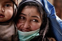 A new children's hospital had opened in Herat in 2011 and many parents came to get the only vaccine against Tuberculosis for their children. The mothers and grandmothers sit for hours on the cold and dusty hospital floor. Access to vaccines and treatment for children with Tuberculosis remains a great challenge in Afghanistan. Security is not the only concern, but depleted medicine stocks due to political barricades, lack of donor interest in Afghanistan, as the country slips from the news and our consciousness, hinder children to receive the care they need to survive.<br>Baba I Barq Comprehensive Health Centre. Herat, 2012