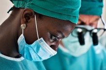 Children's Surgical Hospital, operating theatres. Surgeons Andrea Franchella and Daisy Akurete operate on Jayson Wasswa Lubega, 2 years old, who burned himself with hot soup. Entebbe, Uganda, 2023