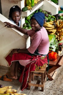 Mercy is 20 years old and sells fruit and vegetables at the Kitooro market. She lives with her grandmother. Entebbe. Uganda, 2023